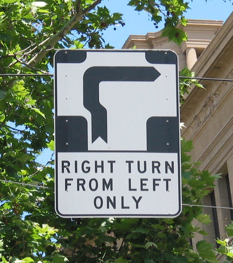 Melbourne sign directing drivers to make a right turn from the left lane