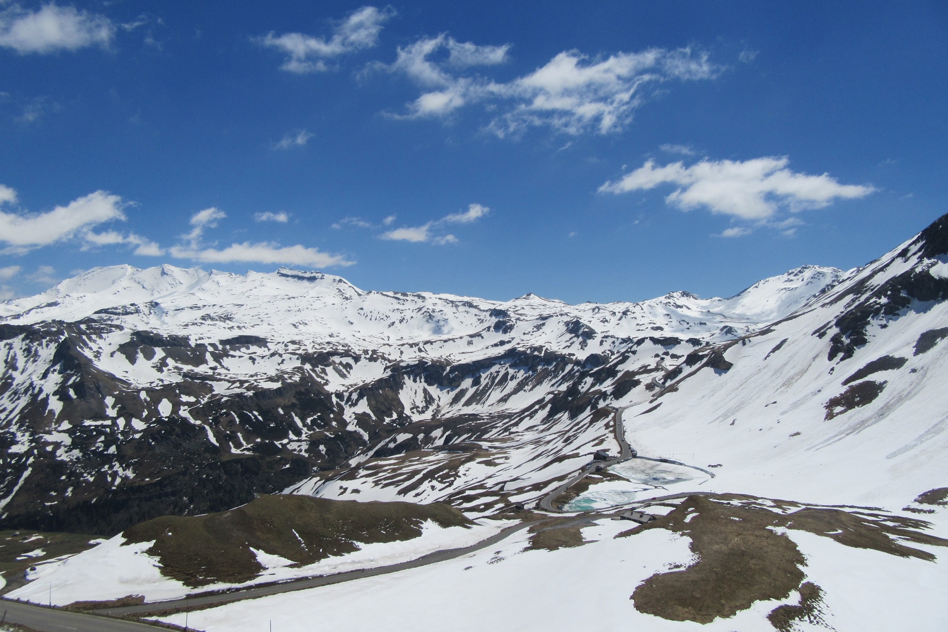 Grossglockner High Alpine Road winding through snow-covered Austrian mountains