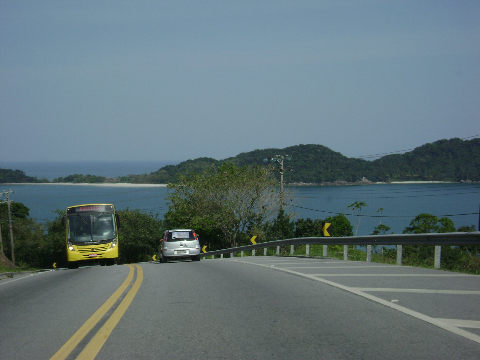 Curving Rio-Santos coastal road beside a bay in Brazil