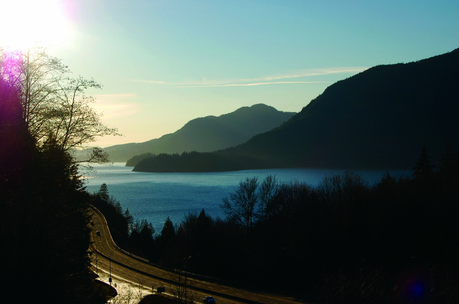 Winding Sea to Sky Highway beside water and mountains in British Columbia