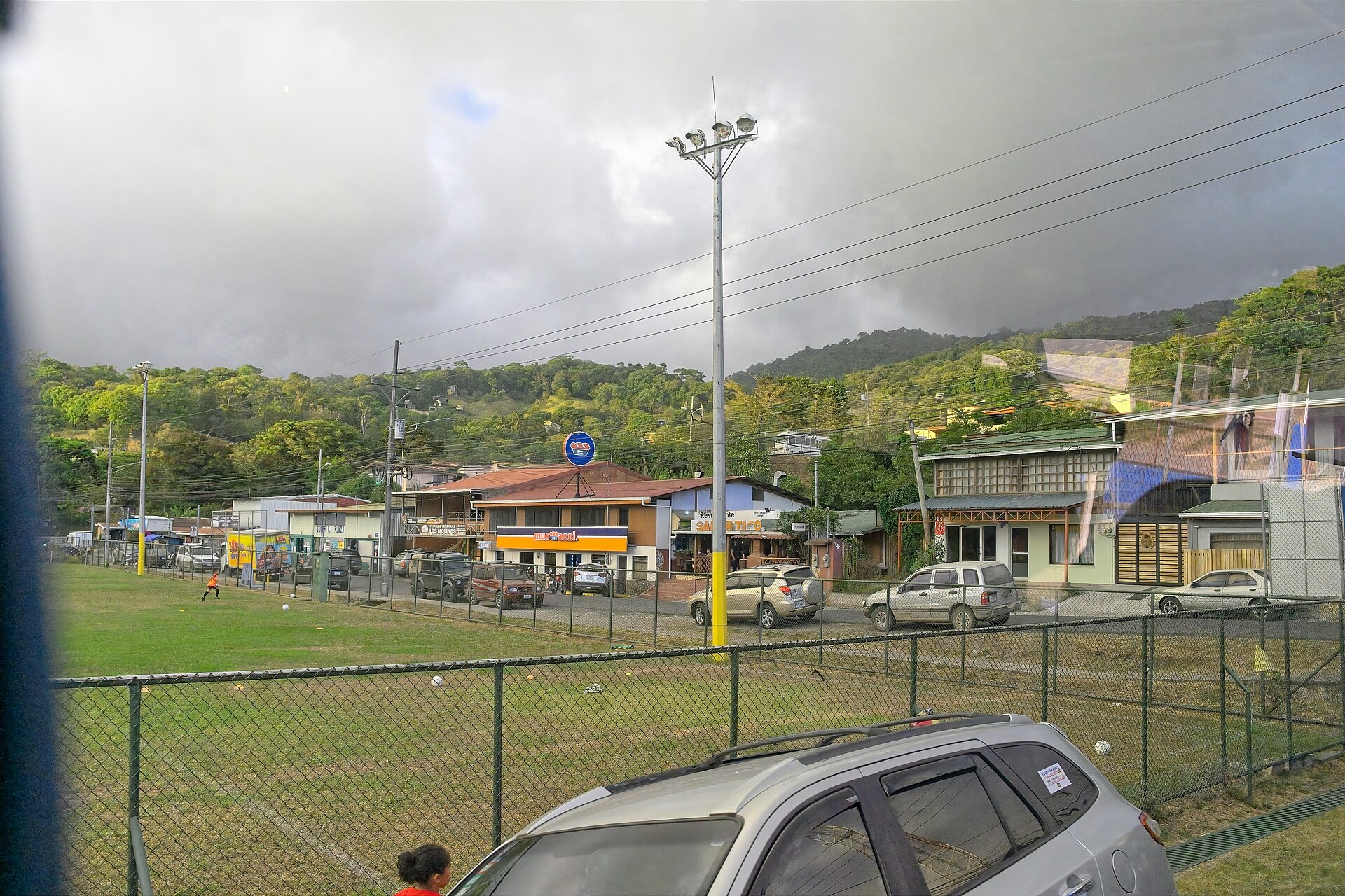 Monteverde hillside and town road under low cloud in Costa Rica