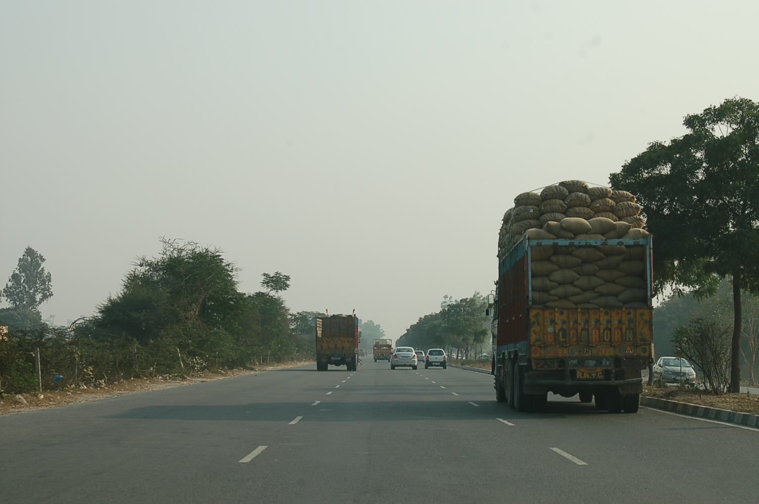 Mixed traffic on an Indian highway toward Delhi