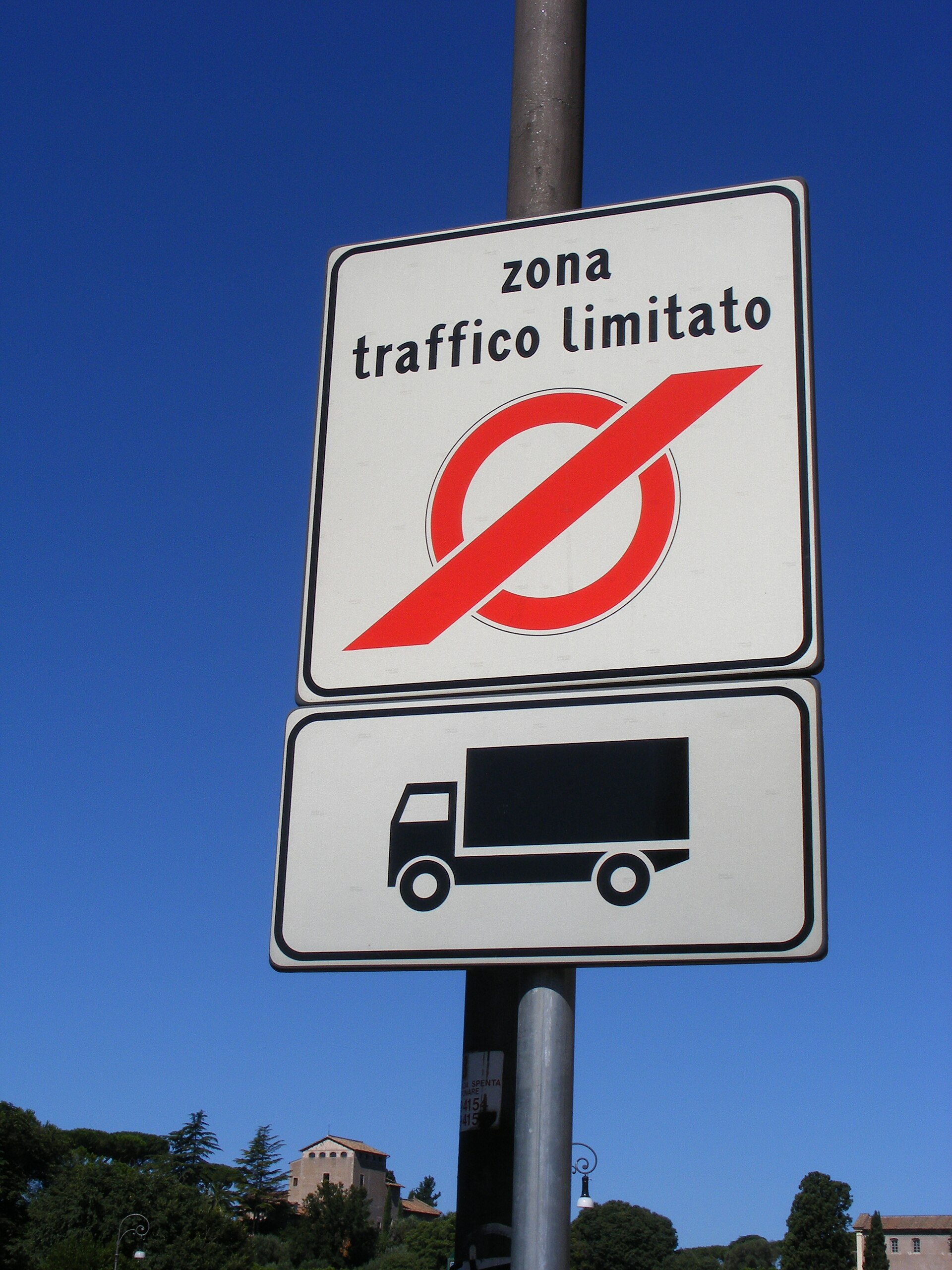 Italian Zona Traffico Limitato sign in Rome with a panel showing a vehicle restriction