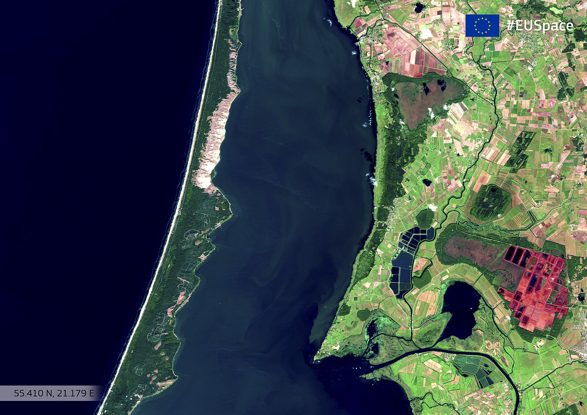 Satellite view of the Curonian Spit separating the Curonian Lagoon and Baltic Sea in Lithuania