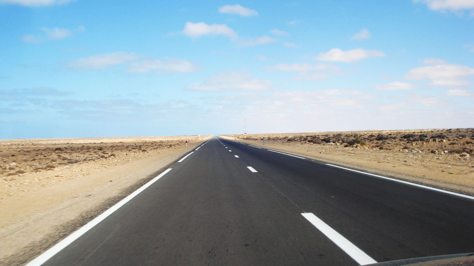 Paved road across the Moroccan Sahara