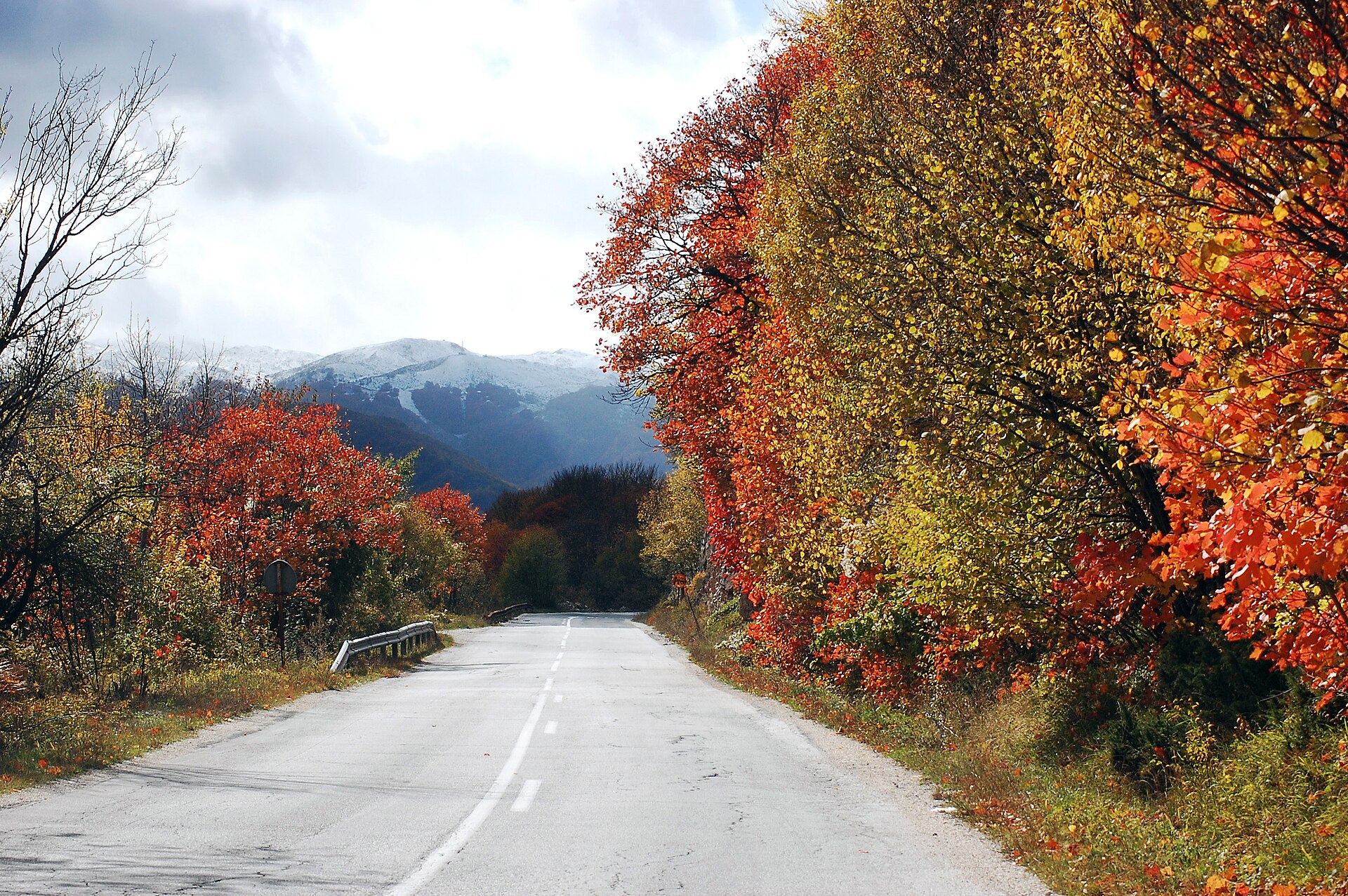 Autumn road leading toward Mavrovo in North Macedonia