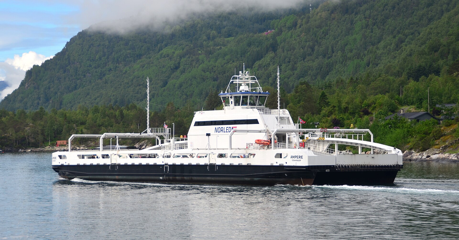 Electric car ferry Ampere crossing a Norwegian fjord near Lavik