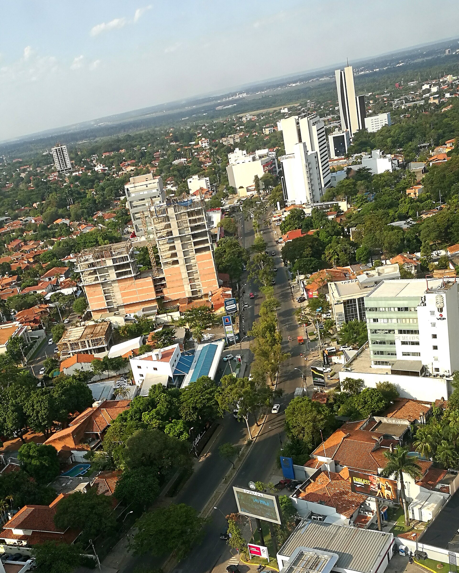 Aerial view of an urban arterial and business district in Asunción, Paraguay