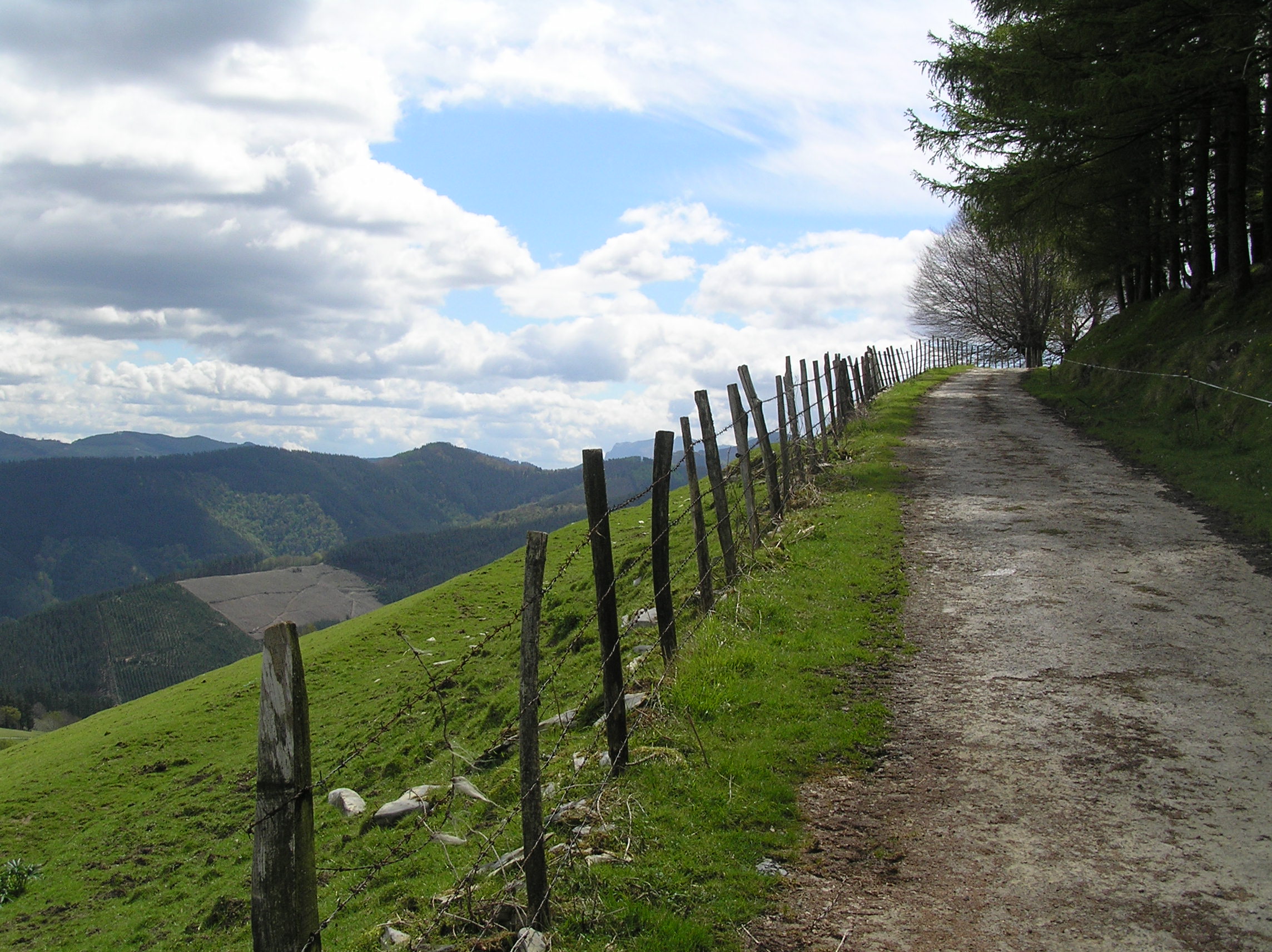 A mountain road in Spain with a narrow paved route